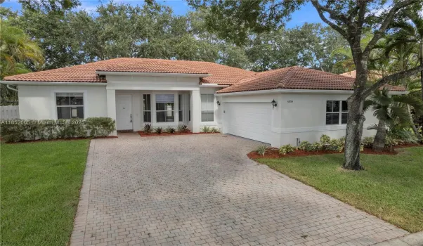 At the front of the house there is space to park 4 vehicles. All the trees around the back of the property help give shade and keep the house cooler during the hot summer months.