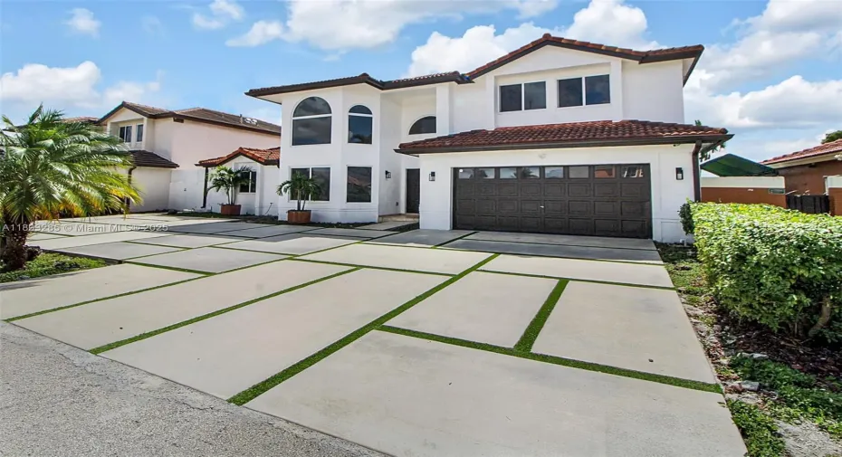 This property has almost 3,800 square feet of living space with 2,881 square feet under air. Parking for 6-8 vehicles. Driveway is poured reinforced concrete.