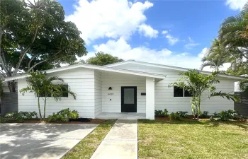 Front Exterior Siding Detail with Metal Roof