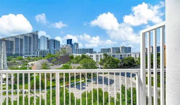 Balcony – Expansive balcony with ocean and skyline views, perfect for enjoying Florida sunsets. Keywords: ocean view condo, Sunny Isles Beach penthouse, balcony with skyline view, luxury living in Sunny Isles.