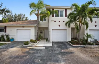 Front view of the townhouse with an attached garage.
