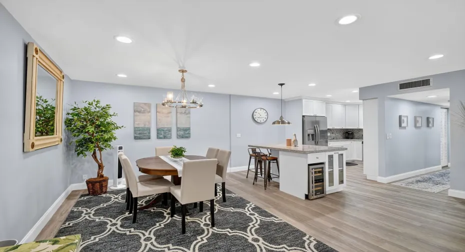 Stunning entrance to the space with a coastal decor throughout. New roof, AC, Impact Windows!