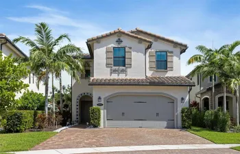 Lush Vegetation & 3 Car Driveway