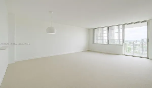 Digital removal of furniture to appreciate bright space on living area