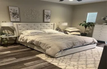 Large Master with volume ceilings, 8 ft doors and updated bathroom with double vanity and seamless shower door. Currently Vacant