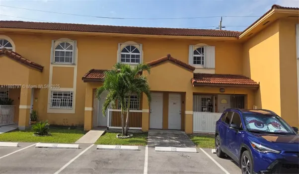Front of building with parking