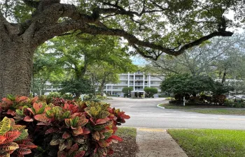 5 story building with luscious landscaping