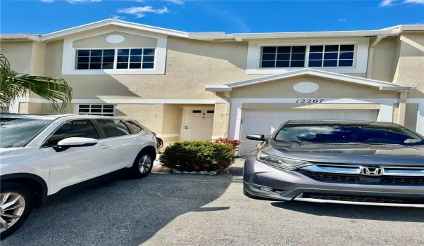 Front of Home 1 Car Garage and 2 parking spaces