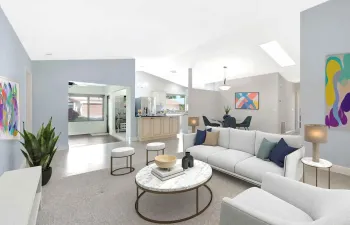 Welcome home! FULLY UPDATED home with a huge sunroom. 2 car garage!