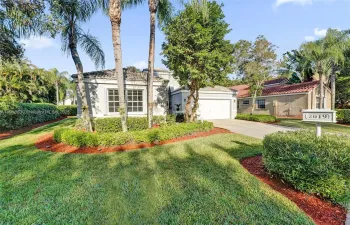 Surrounded by trees, this perfectly landscaped 4 bedroom home is perfect for your family