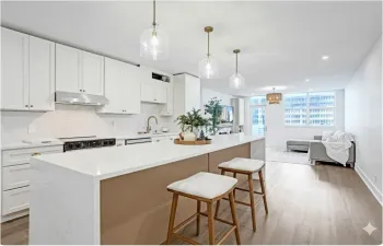 Updated kitchen.

*Please note that the unit shown in the photographs is not the unit for sale. The unit available will feature a nearly identical layout, design, and finishes. The projected completion timeline for the renovation is mid-January.