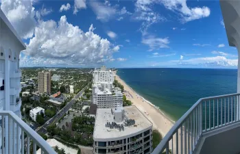 Large penthouse terrace overlooking ocean & skyline