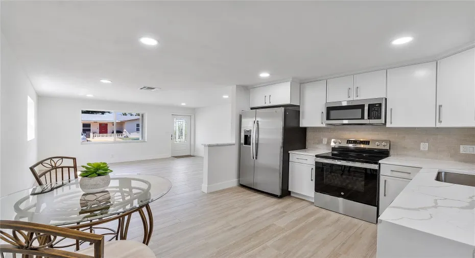Freshly renovated kitchen with new GE stainless steel appliances.