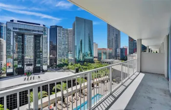 View from balcony of the pool and Brickell, with a a it of view of the Bay
