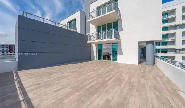 Single level residence with kitchen/living opening directly to the 980 SF patio