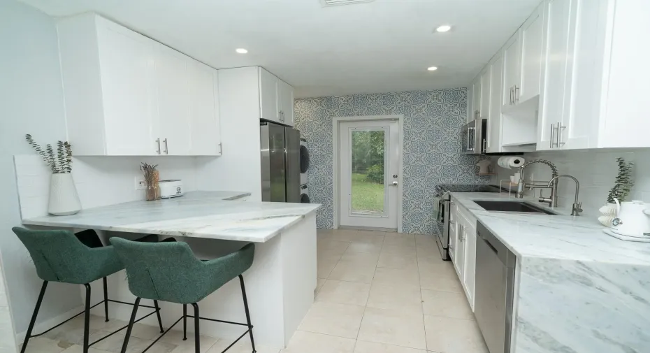 Stainless appliances, granite countertops, new cabinetry