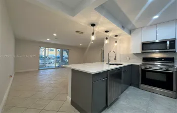 Gorgeous remodeled open kitchen with all new Italian cabinets and quarts countertops
