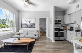 Welcome home to your open-concept kitchen and living room
