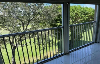Golf course view from newly screened patio new ceiling fan