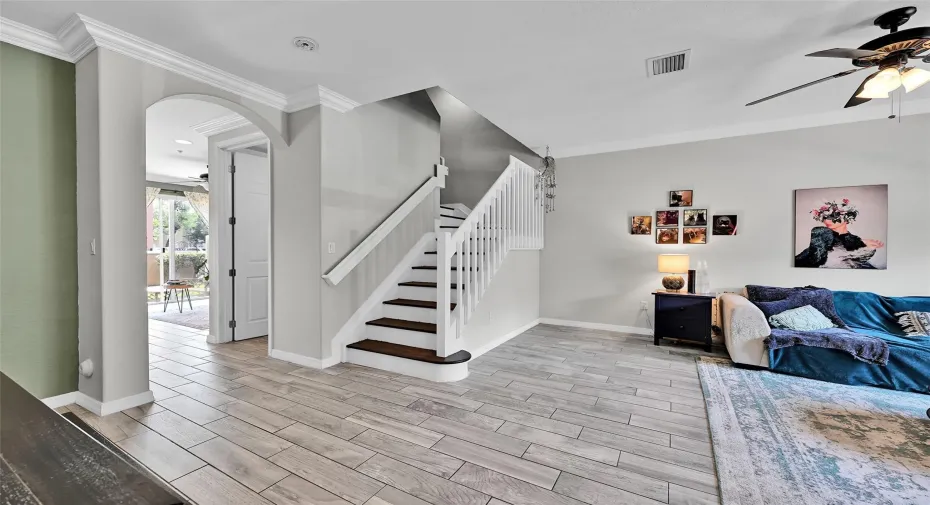 Plank Tile flooring throughout , 9ft Ceilings, Crown Molding and much more!