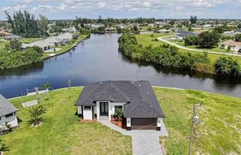 Discover an EXCEPTIONAL opportunity to own this FRESHWATER FRONT SWFL PARADISE!