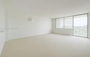 Digital removal of furniture to appreciate bright space on living area
