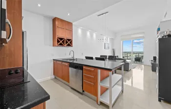 Kitchen open to Dining and Living Spaces