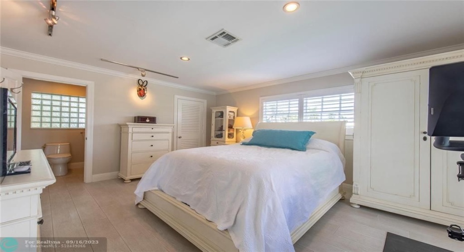 Second master bedroom suite with private bath and walk-in closet.