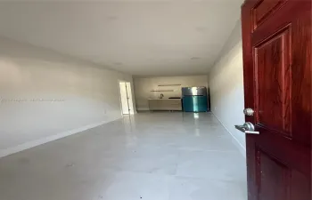 SPACIOUS LIVING ROOM AREA WITH BRAND NEW APPLIANCES