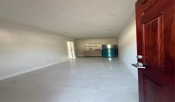 SPACIOUS LIVING ROOM AREA WITH BRAND NEW APPLIANCES