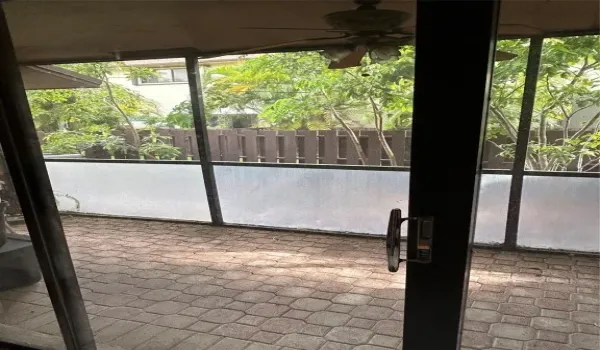 Screened in patio and storage