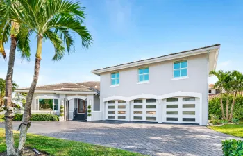 Resort-like living in this masterfully designed custom built home, right on Lake Mangonia -complete with one-bedroom apartment/Mother-in Law suite above the garage