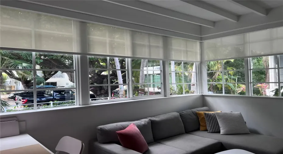 Amazing light comes in this apt with view of lush gardens