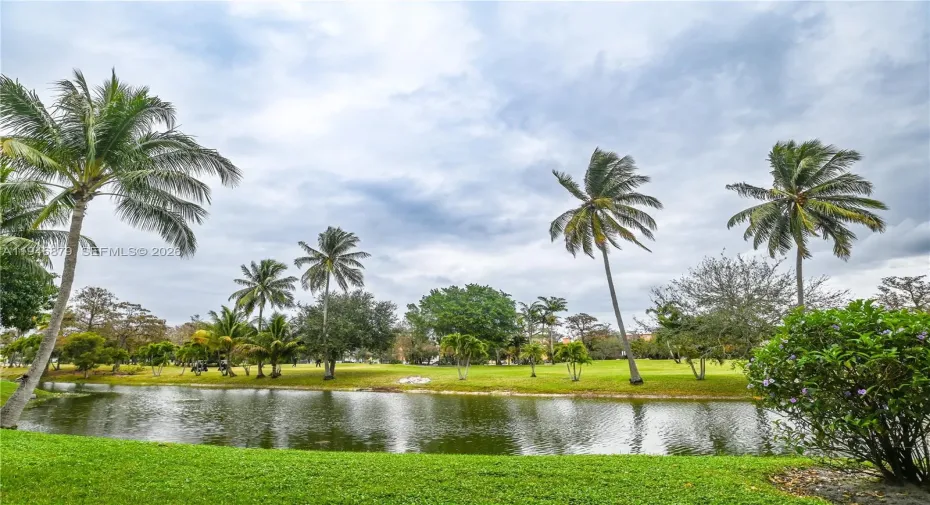 View of golf course and water