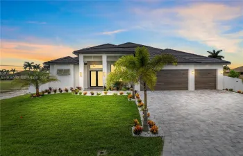 Prepare to be CAPTIVATED by this CONTEMPORARY MASTERPIECE built in 2024 & designed to SHOWCASE the VERY BEST of SOUTHWEST FLORIDA LIVING!