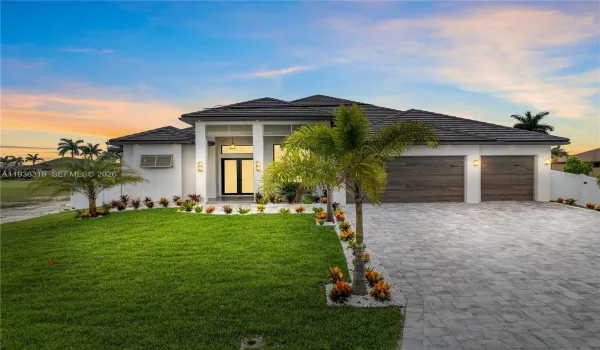 Prepare to be CAPTIVATED by this CONTEMPORARY MASTERPIECE built in 2024 & designed to SHOWCASE the VERY BEST of SOUTHWEST FLORIDA LIVING!