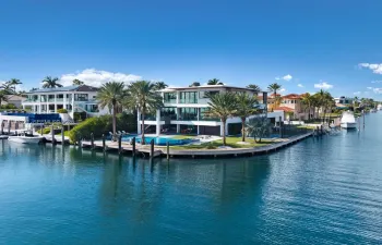 Beautiful modern home with 300 feet on the water. Corner lot with access to Biscyane Bay makes this home unmatched.