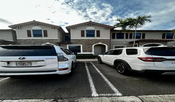 Entrance and 2 Parking