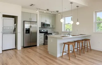 Photo is of another unit in the building, but closely resembles unit 303.