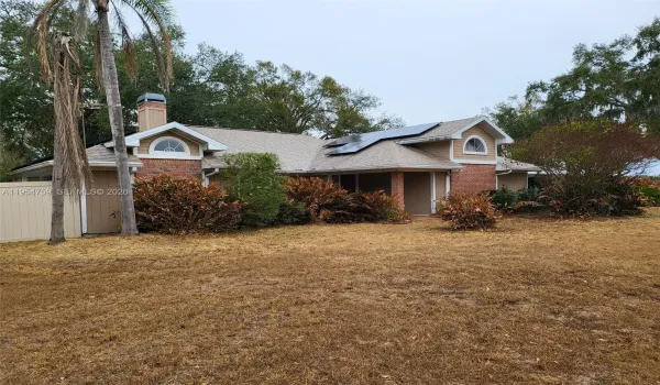 Front view of home on private acreage