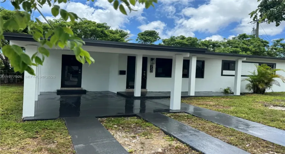 Front close up view with cover car port