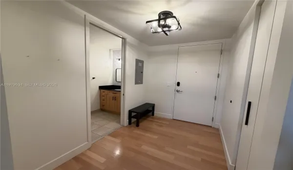 Front Door - Hallway Closets & Half Bath