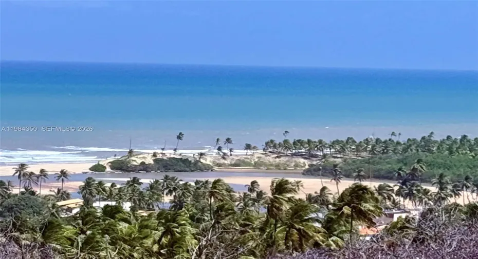 Post card of the region! PONTAL BARRA DO ITARIRI (we own it, but can't built on the this tip of the pennisula.)