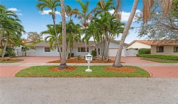 9741 SW 3rd street boasts beautiful and welcoming curb appeal and enjoys fantastic location close to top schools, shopping and dining.