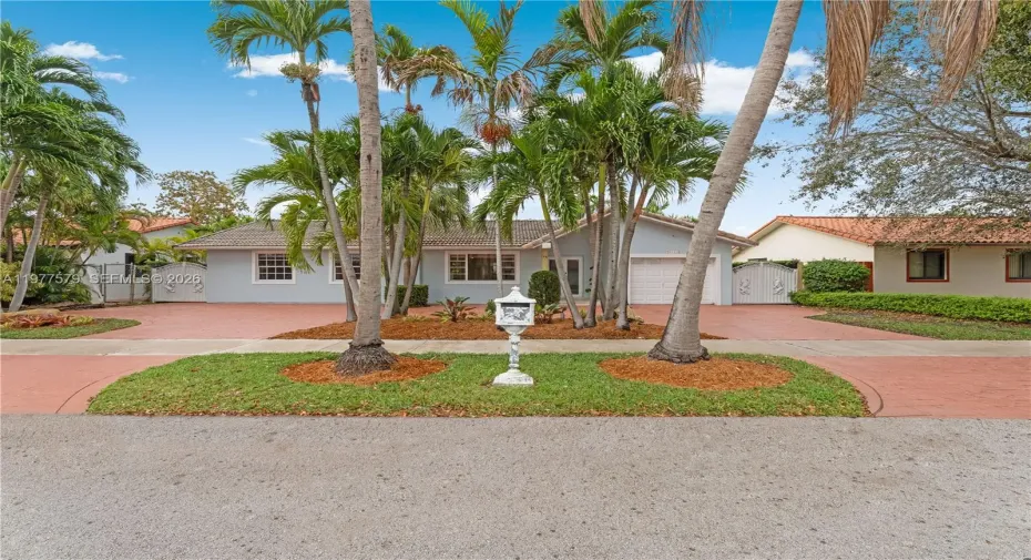 9741 SW 3rd street boasts beautiful and welcoming curb appeal and enjoys fantastic location close to top schools, shopping and dining.