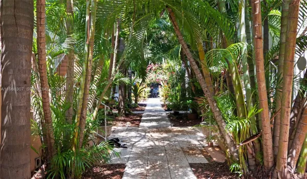 Beautiful, lush garden in walkway of gated community.