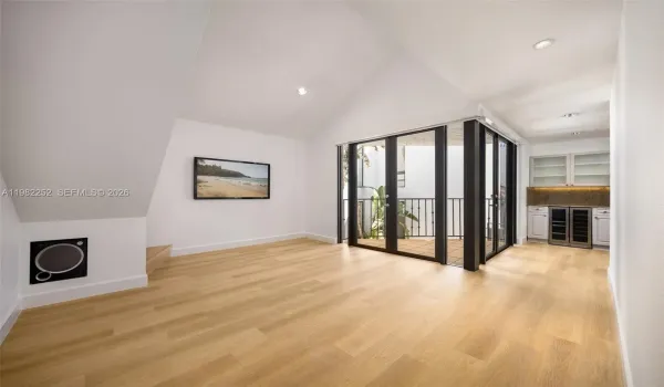 Welcome to this special home with vaulted ceilings and ample light. Motorized shades for the double doors in Living Area & Kitchen