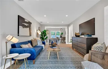 Bright living area with direct flow to dining area and backyard