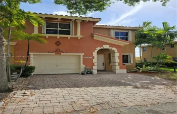 Beautiful front elevation with great curb appeal and welcoming entrance.