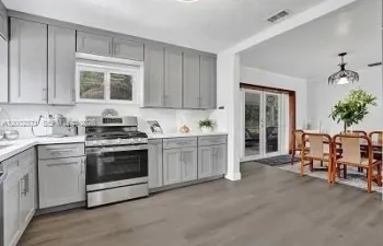 Updated kitchen featuring a gas stove
